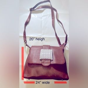 Brown vegan leather woman hand bag.